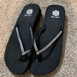 Yellow box flip flops